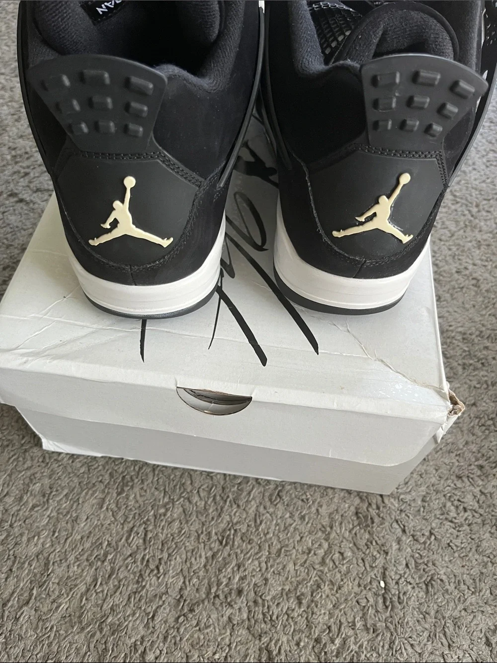 AIR JORDAN 4 RETRO Men’s Black and White Sneaker